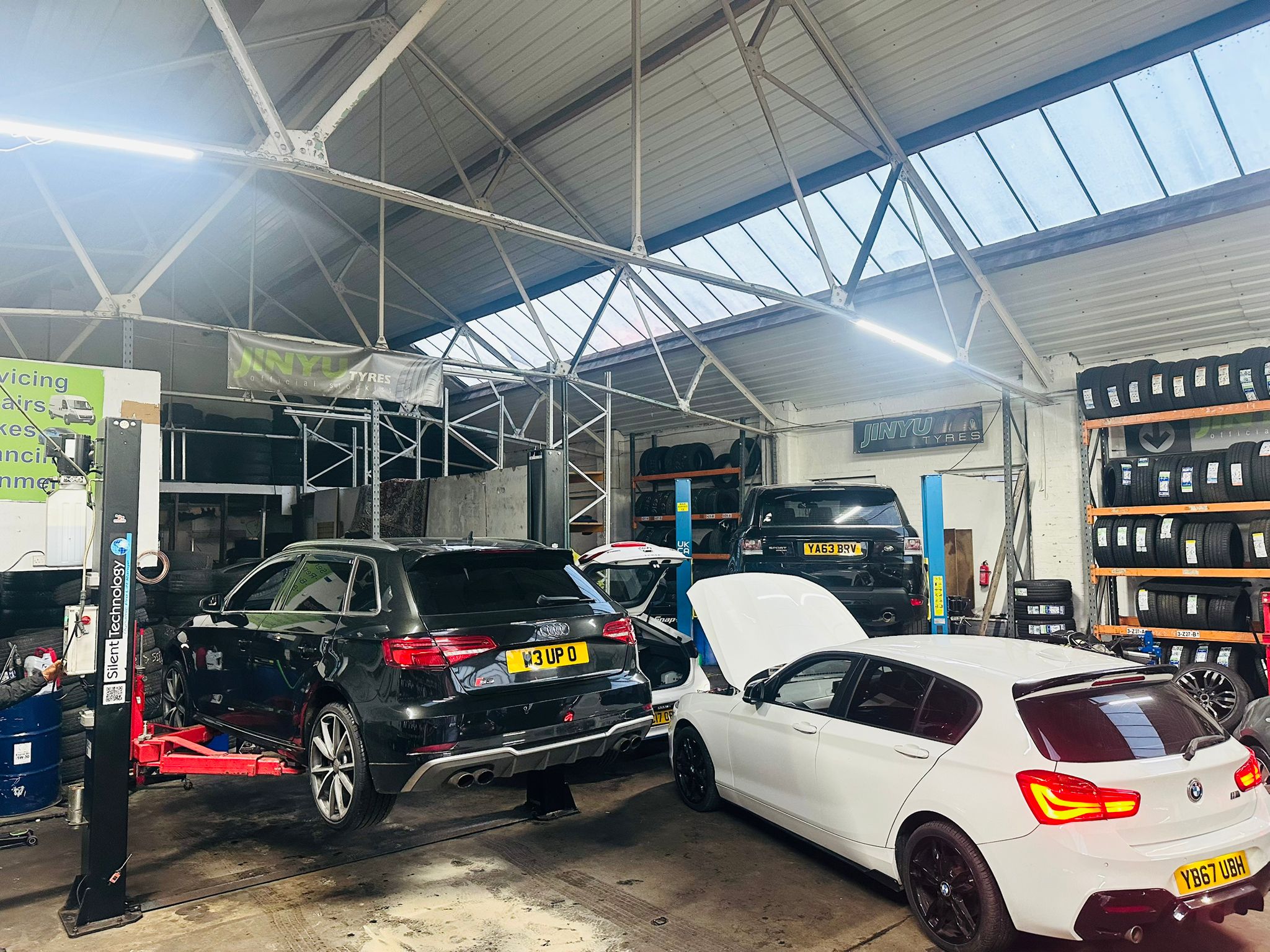 Safe Motors workshop with vehicles being serviced